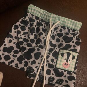 Cow Print Swim Trunks with Green Gingham Waistband